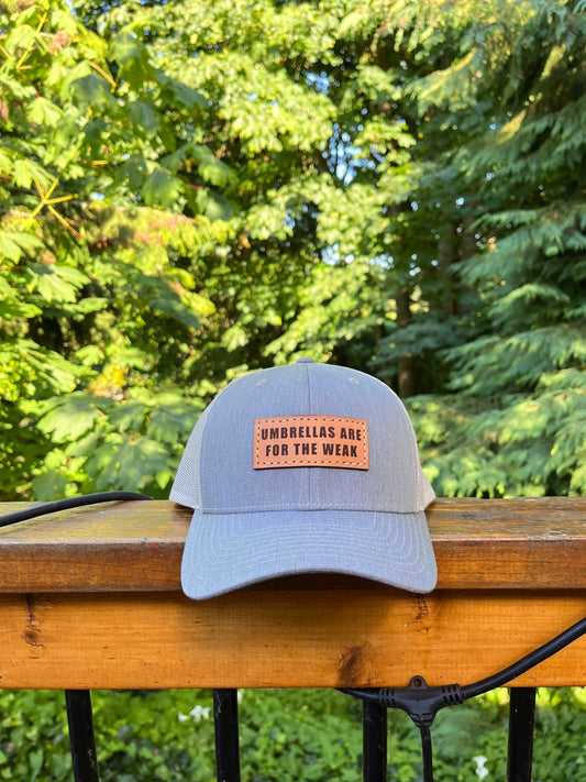 Umbrellas are for the weak, seattle trucker hat